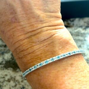 Blue topaz and diamond bangle bracelet